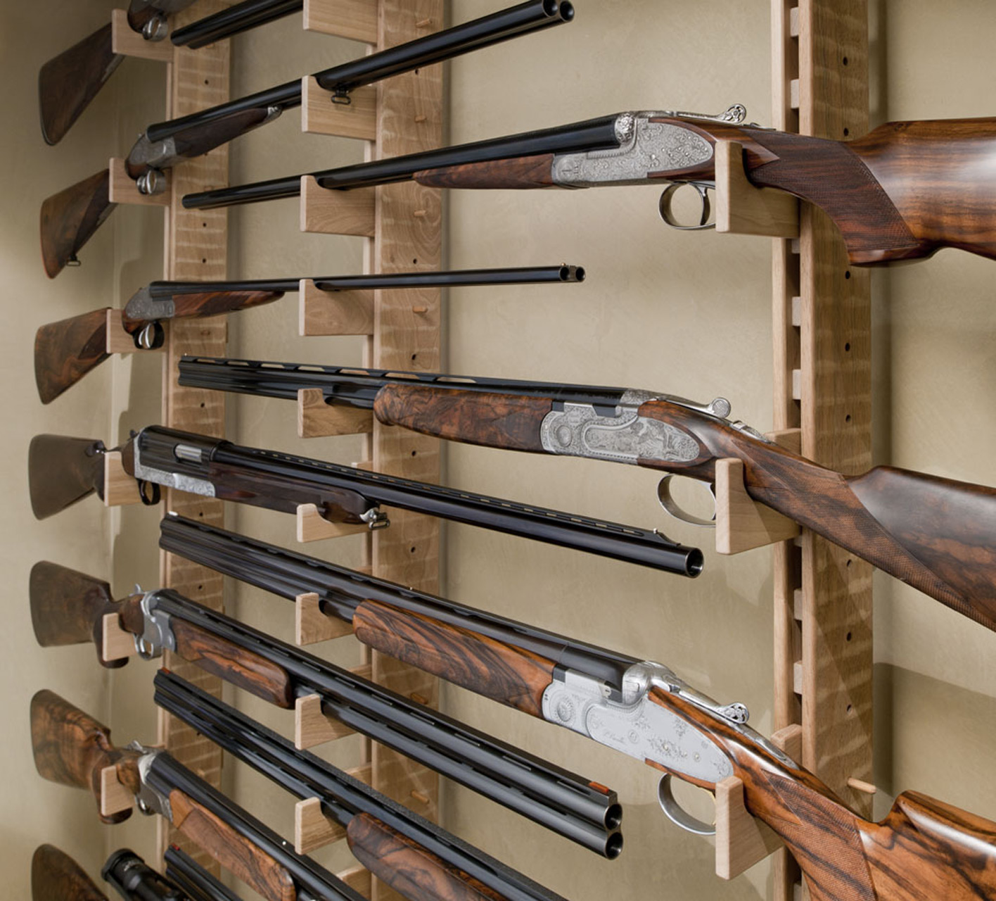 Gun rack and cupboard in Italian walnut.