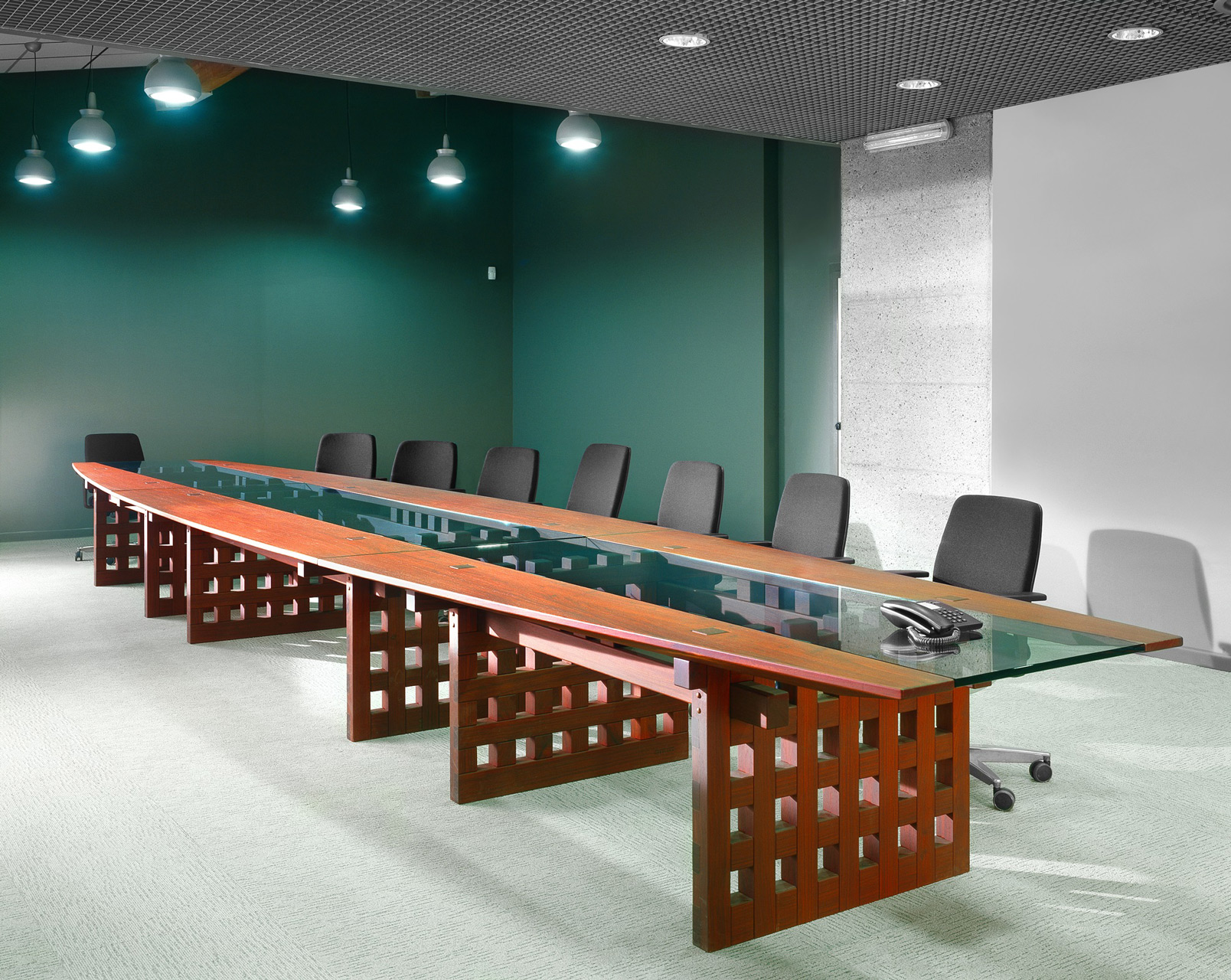 Conference table in paduak wood.