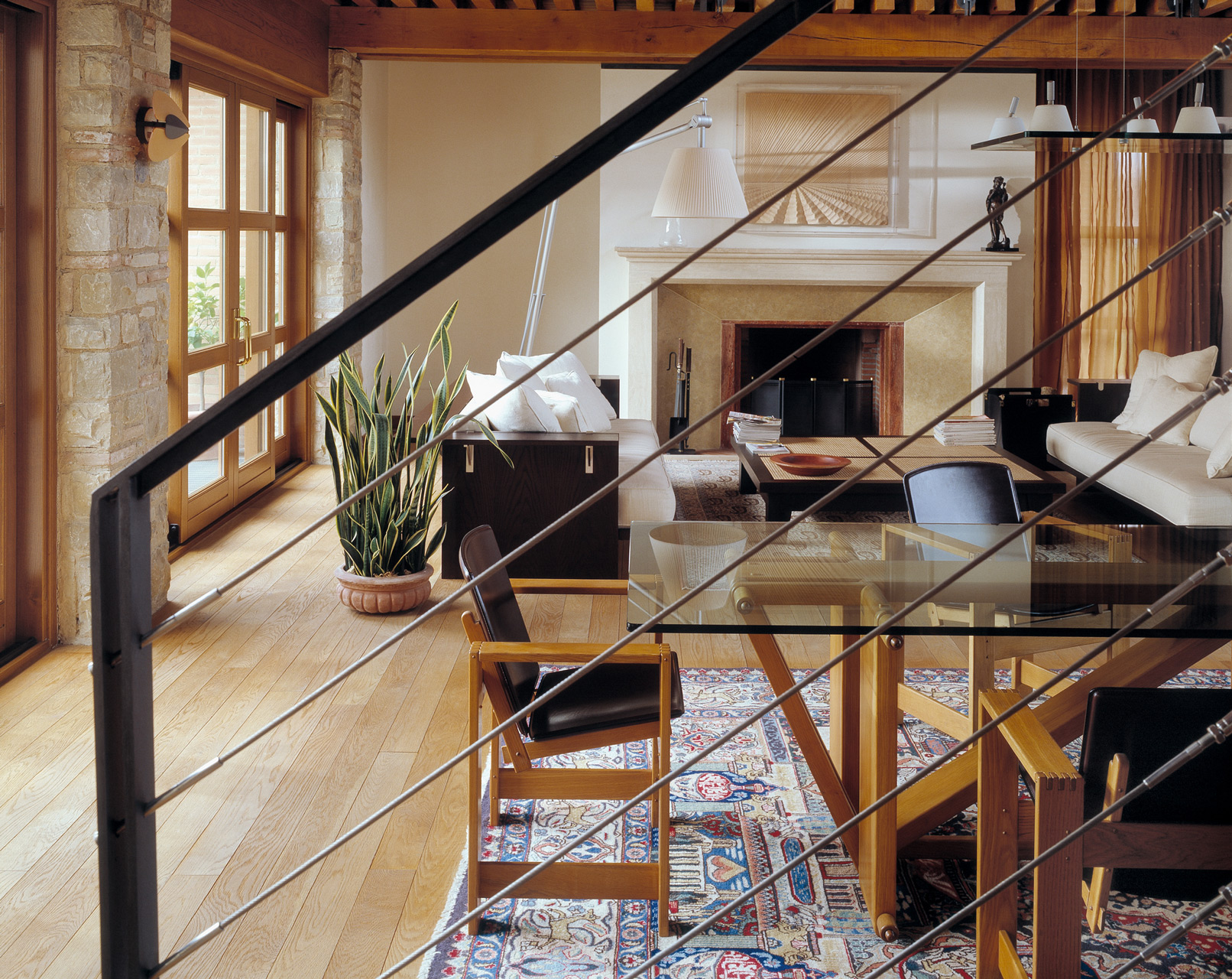 Lombardo table in oak with glass top.